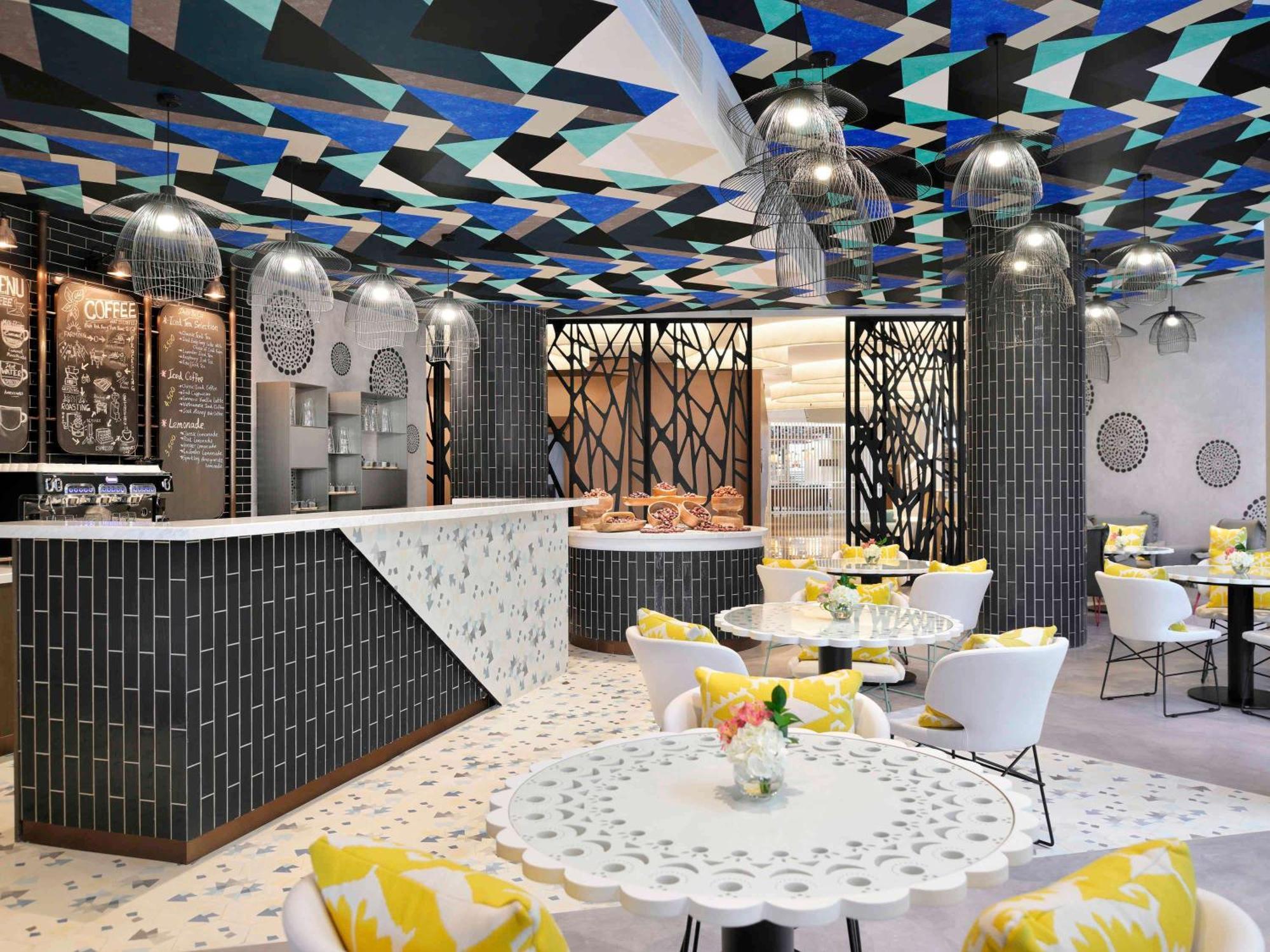 Moevenpick Hotel & Apartments Ghala Muscat Exterior photo The interior of the restaurant