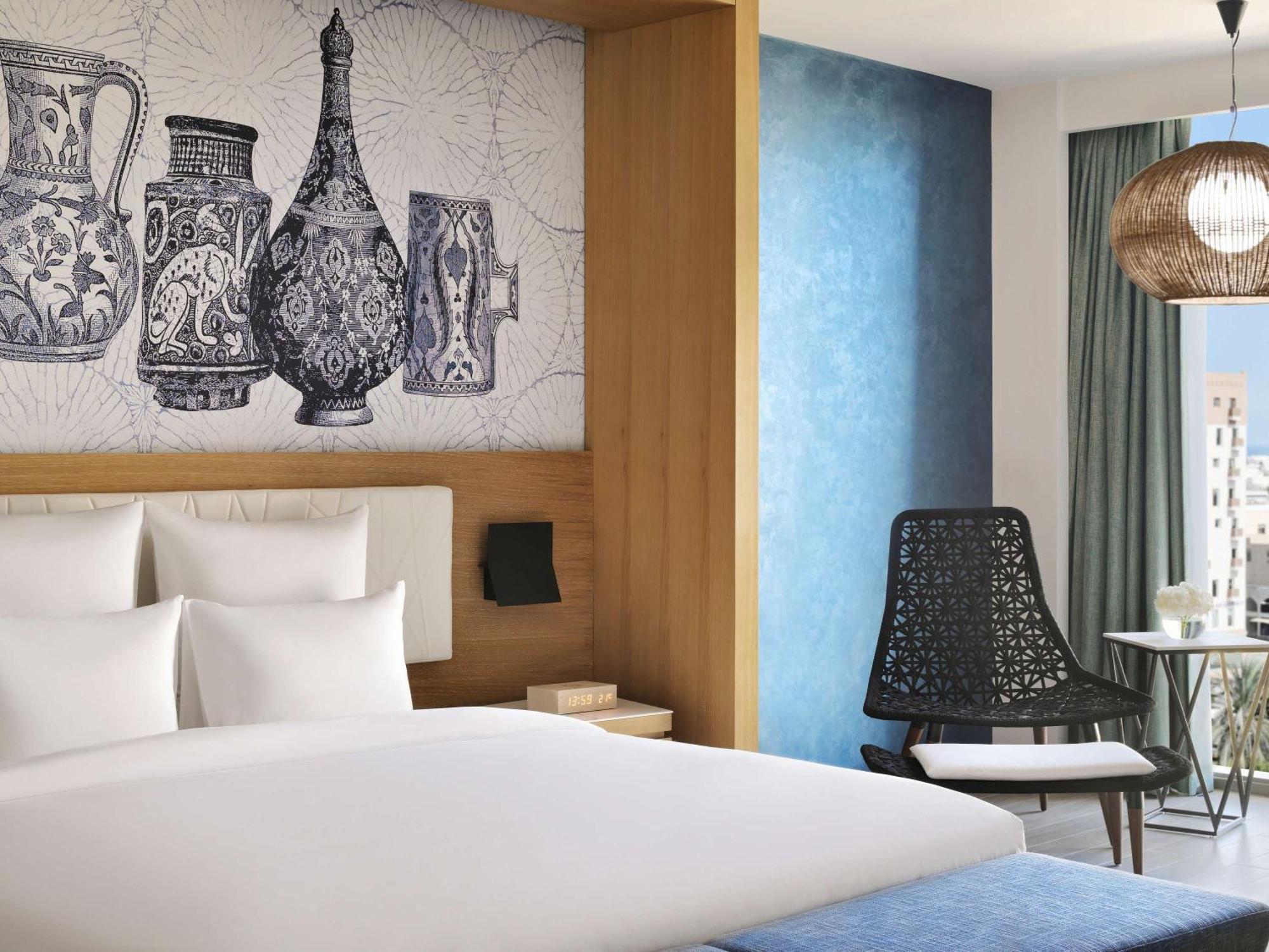 Moevenpick Hotel & Apartments Ghala Muscat Exterior photo Deluxe Room