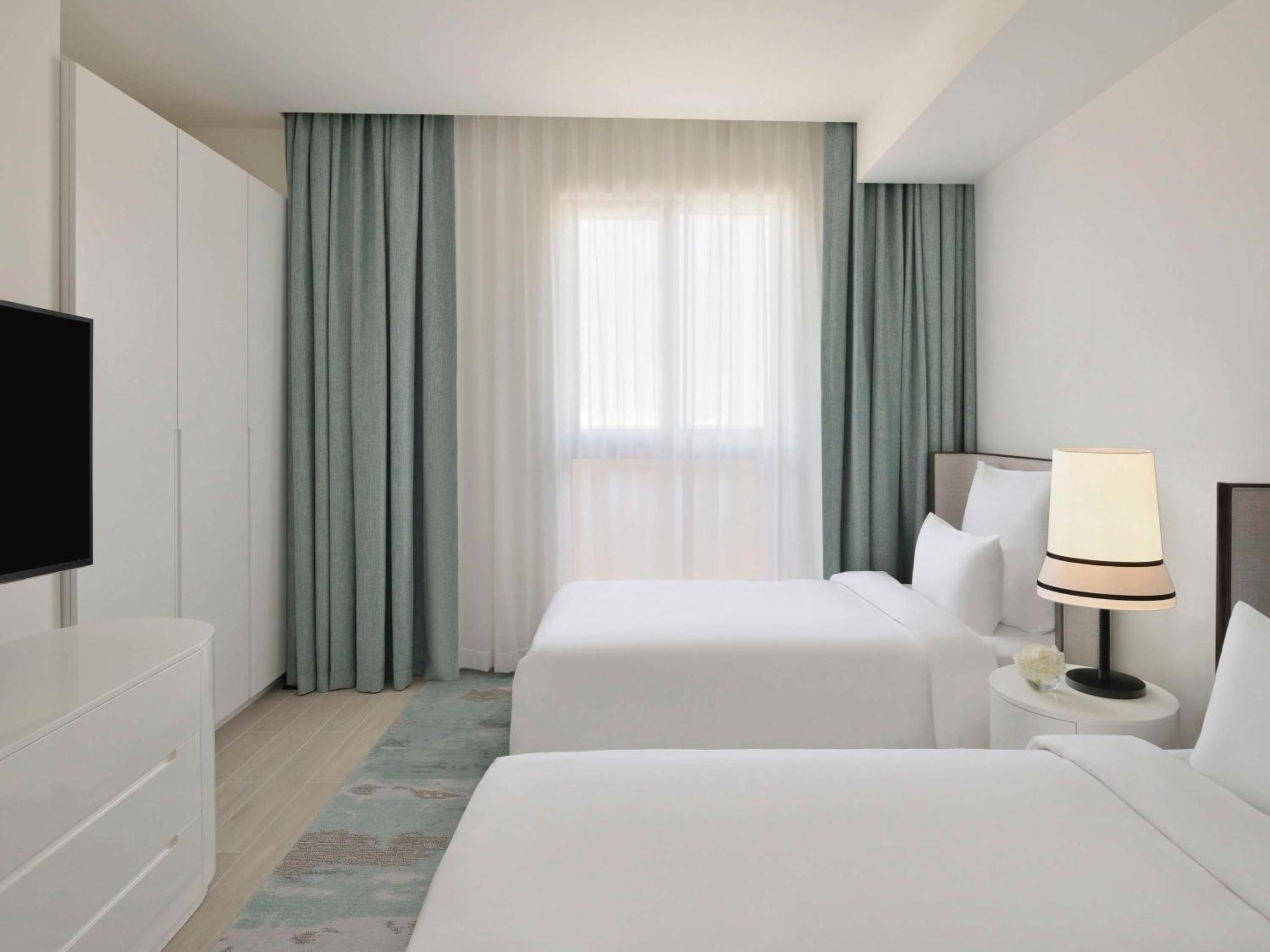 Moevenpick Hotel & Apartments Ghala Muscat Exterior photo A typical bedroom at the hotel