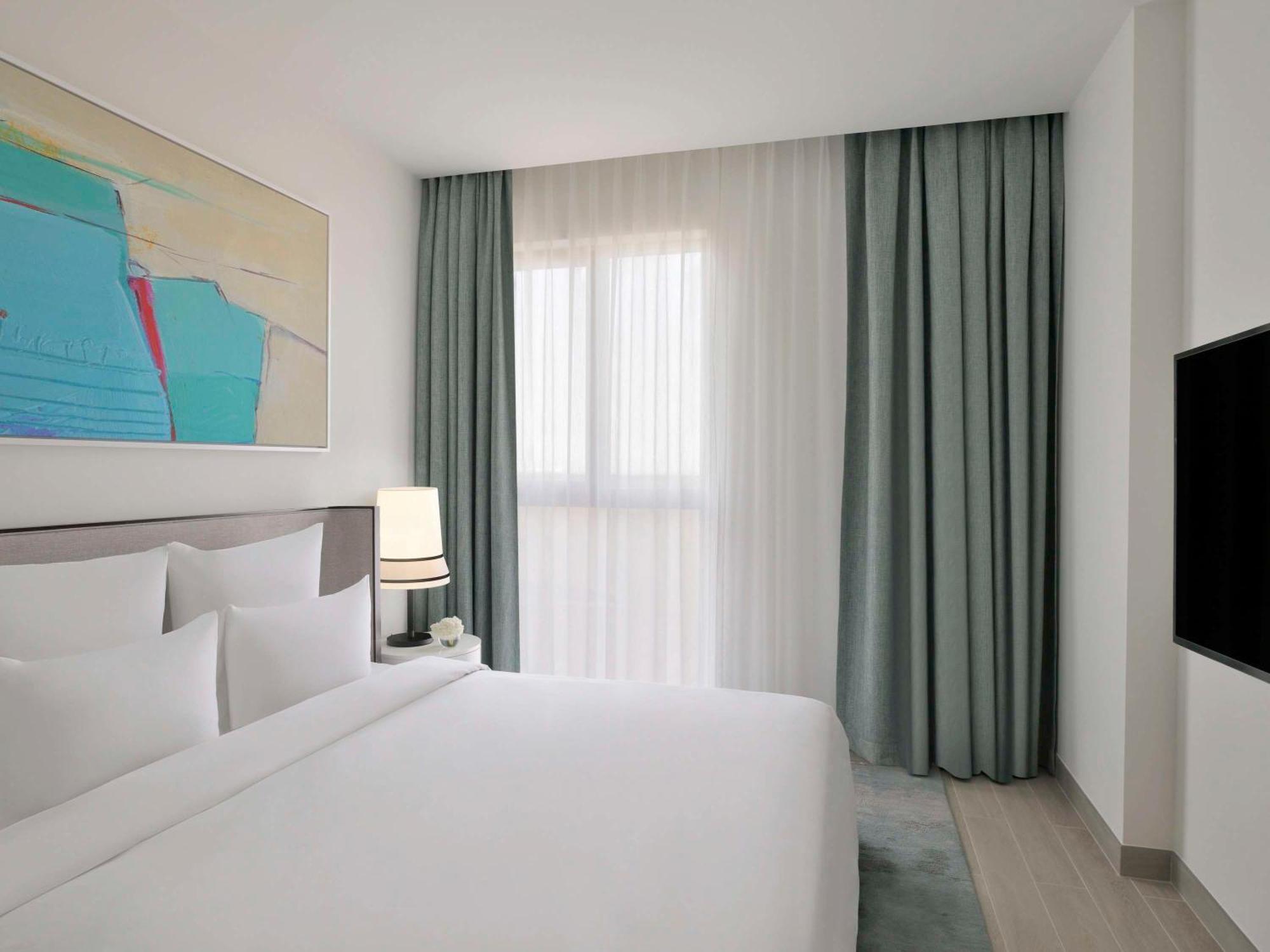 Moevenpick Hotel & Apartments Ghala Muscat Exterior photo A bedroom at the hotel