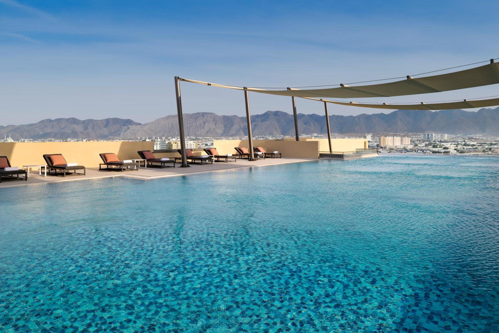 Moevenpick Hotel & Apartments Ghala Muscat Exterior photo The pool at the Ritz-Carlton, Bahrain